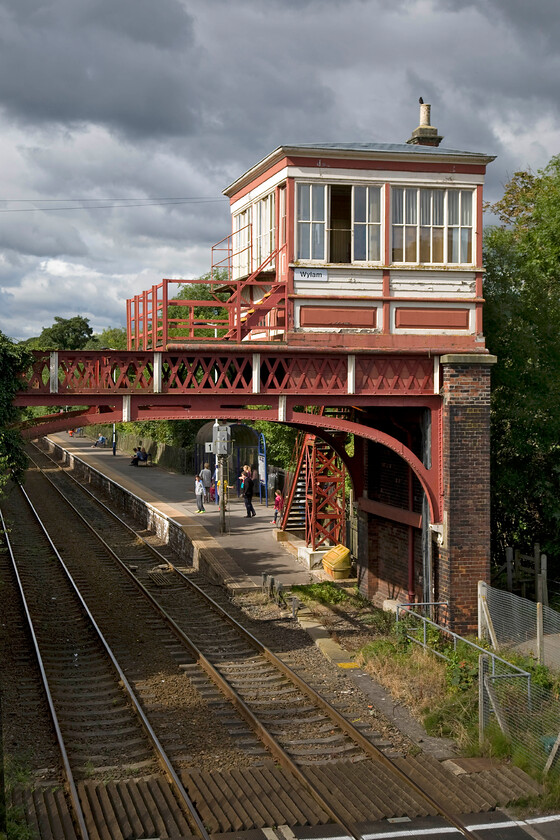 Wylam signal box (NE, 1897) 
 Wylam signal box is the second example of an over-line, elevated type structure, once a popular design for the North East with the only other surviving signal box of this design located at Hexham seen earlier in the morning. Along with the wrought iron footbridge on which I am standing it is a Grade II listed structure. What a grand and commanding spot it must be to be a signalman! 
 Keywords: Wylam signal box 1897 North Eastern Railway