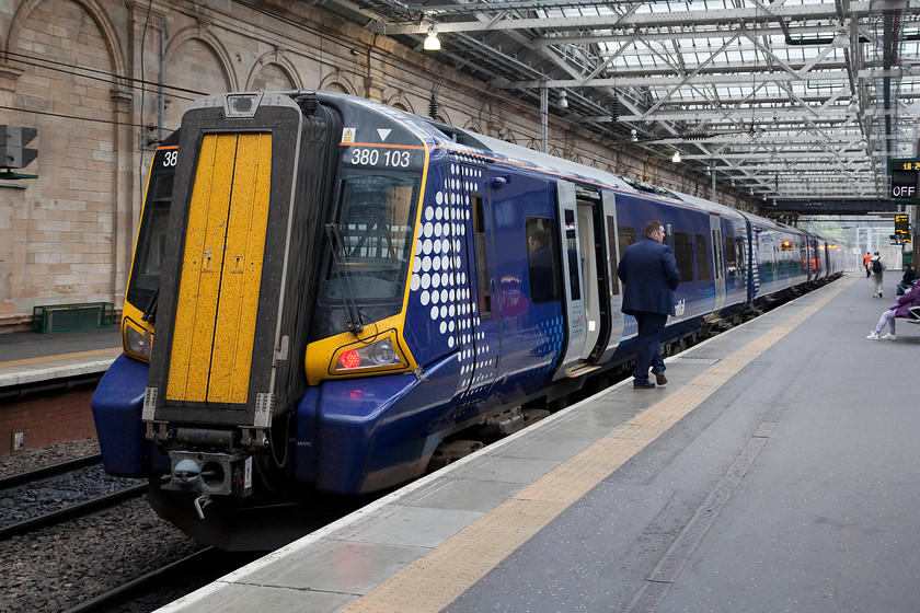 380103, SR 17.54 North Berwick-Ayr (1K59), Edinburgh Waverley station 
 380103 pauses at Edinburgh Waverley's platform eleven with the 17.54 North Berwick to Ayr working. This is an interesting journey that crosses Scotland from coast to coast. I am not sure about the looks of these class 380s? Their unusual pitched front ends do look a little odd to my eyes. 
 Keywords: 380103 17.54 North Berwick-Ayr 1K59 Edinburgh Waverley station