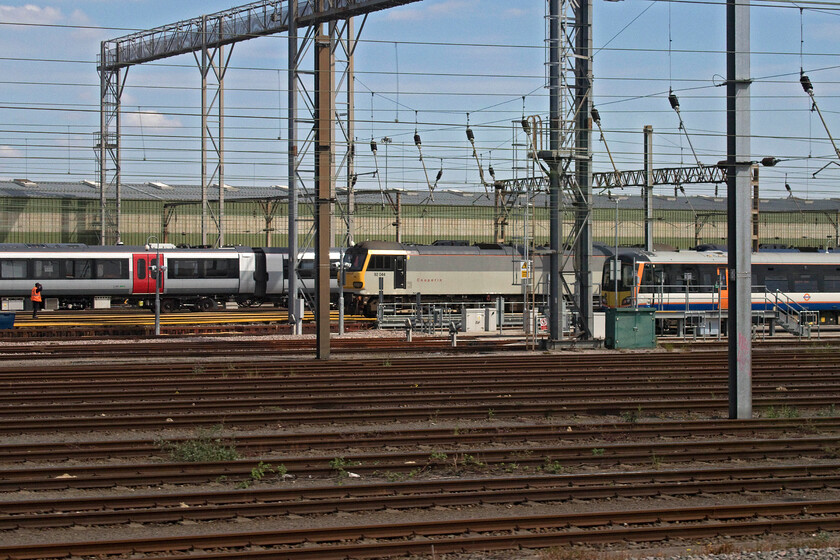 92044, stabled, Wembley Yard 
 92044 'Couperin' is seen stabled in Wembley Yard with one of LO's Class 378s to the right. Behind is one of Greater Anglia's new Class 720s. From the identifiable carriage number, this appears to be set 720516 that whilst it is based at Ilford it is not yet in service. 
 Keywords: 92044 stabled Wembley Yard Couperin