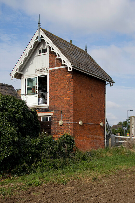 Ancaster signal box (GN, c.1873) 
 Ancaster signal box is a delightful Great Northern structure dating from around 1873 according to the Signalling Records Society. Unlike the next box to the east at Rauceby Ancaster has far more ornate bargeboarding and is of smaller proportions. For the present time, Network Rail has no plans to abolish the box and its mechanical signalling but this could change at any time so capture your images whilst you can! 
 Keywords: Ancaster signal box