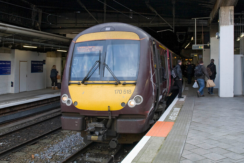 170518, XC 09.10 Nottingham-Cardiff Central, Birmingham New Street station 
 The second train of our journey from Northampton to Bristol waits at Birmingham New Street. Andy and I travelled on 170518 working the 09.10 Nottingham to Cardiff service as far as Cheltenham a journey time of just under an hour. The work to refurbish and improve these units has meant that they are far more suited to these types of journeys but one must still be wary as to where one sits as over the engine's can prove somewhat tiresome! 
 Keywords: 170518 09.10 Nottingham-Cardiff Central Birmingham New Street station Cross Country Turbostar