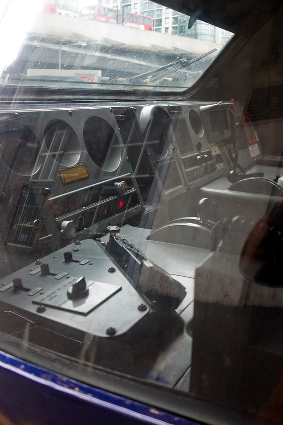 Cab, 43030, 14.57 London Paddington-Bristol temple Meads (1U19, 10L), London Paddington station 
 The driver's control desk of HST power car 43030. It is standing at platform one of Paddington and will work the 14.57 to Bristol temple Meads, obviously when the driver arrives and takes his seat! 
 Keywords: Cab 43030 1U19 London Paddington station