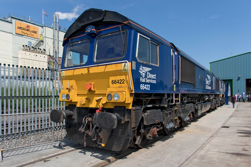 66422, on display, Crewe Gresty Bridge 
 Earlier in the day, 66422 was named 'Max Joule 1958-1999'. This name was previously applied to 20303 that prior to that was carried by 20301. Max Joule was one of DRSs founders and its Managing Director until his untimely death in 1999. Notice the Mornflake cereal mill in the background one of Crewe's larger employers and one of Crewe Alexandra football club's sponsors located, off course at their ground on Gresty Road! 
 Keywords: 66422 Max Joule 1958-1999 Crewe Gresty Bridge