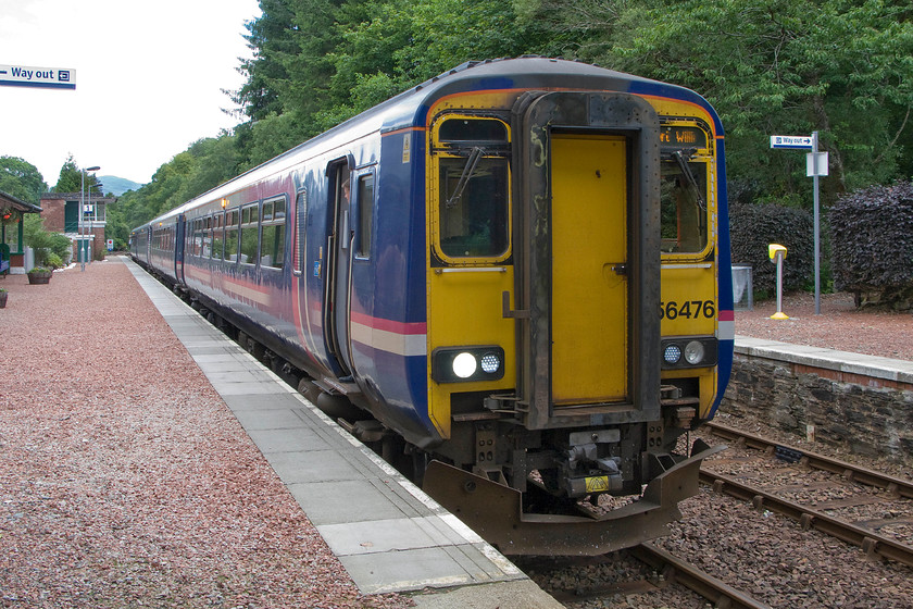 156476, SR 08.21 Glasgow Queen Street-Mallaig (1Y41), Spean Bridge station 
 All the ScotRail stations are well maintained and Spean Bridge is no exception having well-manicured gravel with excellent signage and facilities. Running what appears to the wrong track, 156476 waits at the station with the 1Y41 Glasgow Queen Street to Mallaig service. It is pausing because Spean Bridge is a passing place and a Glasgow service was heading in the other direction. 
 Keywords: 156476 08.21 Glasgow Queen Street-Mallaig 1Y41 Spean Bridge station ScotRail Sprinter