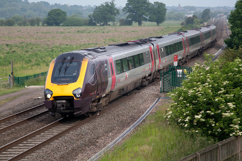 221128, XC 05.11 Manchester Piccadilly-Bournmouth (1O04), Warkworth SP476394 
 221128 forms the 05.11 Manchester to Bournemouth CrossCountry service just South of Banbury. Whilst this spot appears to be a quiet country location looks can be deceiving. I am in-fact standing on the M40 motorway embankment with the traffic thundering past above and behind me. This location is nearly a mile walk along the Jurassic Way from the where the car has to be parked, and then under the motorway bridge and up the bank on the other side. 
 Keywords: 221128 05.11 Manchester Piccadilly-Bournmouth 1O04 Warkworth SP476394