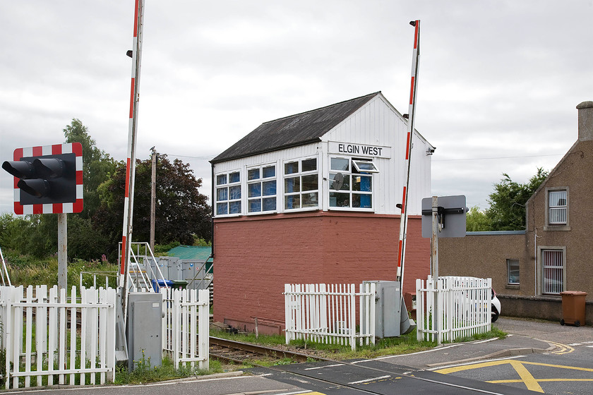 Elgin (West) signal box, ex Mosstowie (Highland, 1902 & 1951) 
 Elgin West signal box sits adjacent to The Wards level crossing that it controls. The box is of rather mixed heritage and not that old so when resignalling arrives in the next few years I suspect that it will succumb. It has only been at this location since 1951 with the brick base built at this time. The top dates from 1901 and is of Highland heritage being secondhand from Mosstowie (closed in 1948) some five miles west of Elgin. 
 Keywords: Elgin West signal box Mosstowie Highland