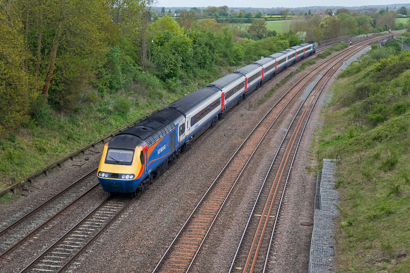 43066, EM 09.32 Nottingham-London St. Pancras (1B28, 2L), Highfield Bridge, Oakley 
 A sight for sore eyes! East Midlands Trains have done a smashing job painting and maintaining their HST fleet. 43066 leads the 09.32 Nottingham to St. Pancras service past Oakley in Bedfordshire taken from Highfield Bridge. 43066 was an Eastern Region power car introduced in 1978 as part of set 254006. 
 Keywords: 43066 1B28 Highfield Bridge, Oakley