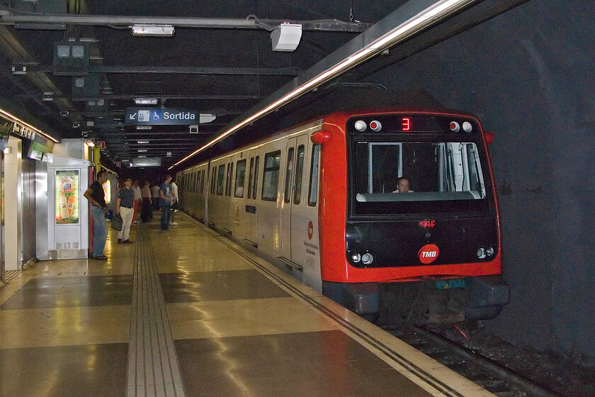 5143, TMB Zona Universitria-Trinitat Nova working, (Maria Cristina-Espanya) Maria Cristina station 
 Line 3 of the Barcelona Metro is operated by fairly new CAF Series 5000 units. One of these, 5143, arrives at Maria Christina station working a Zona Universitria to Trinitat Nova service. We took this train from here to Espanya. Notice that these units are 1,500v DC powered by fixed overhead electrical lines. 
 Keywords: 5143 TMB Zona Universitria-Trinitat Nova working Maria Cristina station