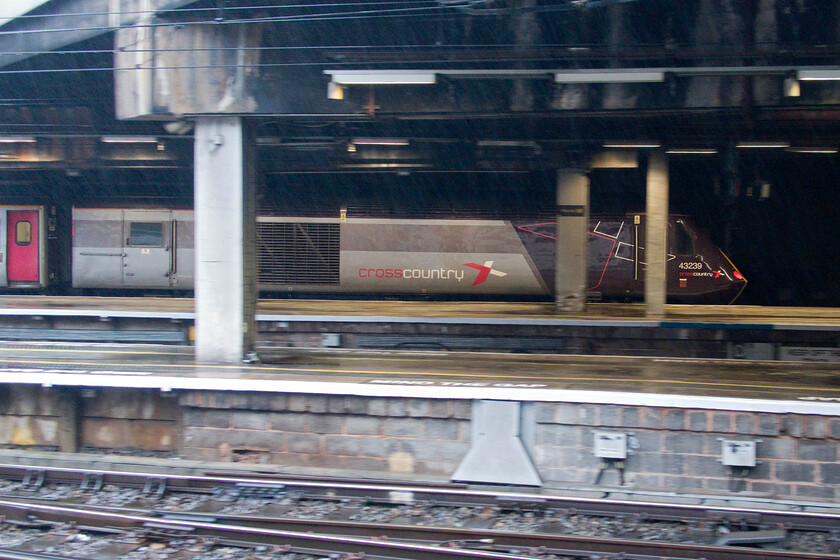 43378, XC 15.27 Plymouth-Leeds (1E63, 14L), Birmingham New Street station 
 Just look at the rain now! As it was so dark and miserable at Birmingham New Street I gambled on a rushed pan shot of the 15.27 Plymouth to Leeds 1E63 HST service as it left taken from the dry of the inside of a Class 350 Desiro through the open door. I actually quite like the effect with 43378 possibly being the last photograph that I take of an HST on a regular timetabled train service before their retirement in a month or so. 
 Keywords: 43378 15.27 Plymouth-Leeds 1E63 Birmingham New Street station Cross Country HST