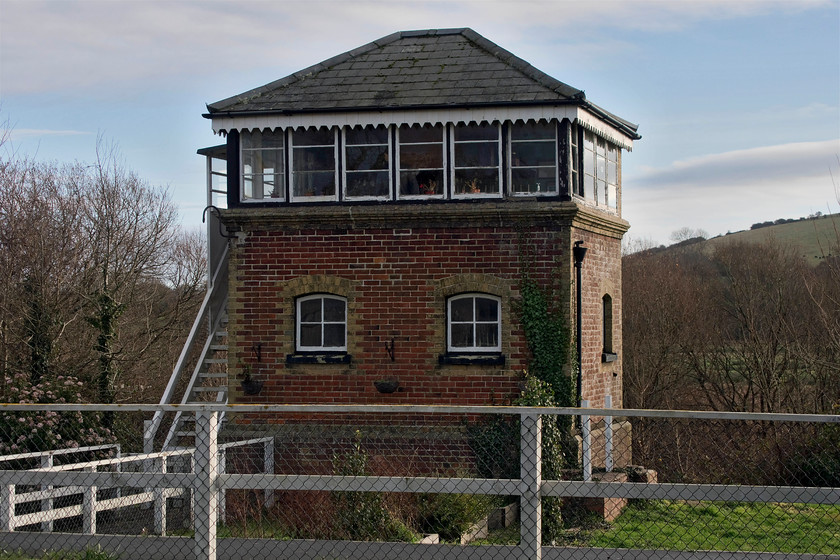 Brading signal box (IoW, 1882) 
 The superb former Isle of Wight Railway signal box at Brading is seen complete with its frame intact. It is a grade II listed structure that has undergone much improvement since it was listed in 1986, closed in 1988 and then re-assessed by Historic England in 2002. It is now a museum and part of the Brading station visitor centre that was closed on the day of our visit, which was Friday 3rd January! With his poor eyesight, Andy thought that the box was manned stating that there was a signalman standing by the levers until I pointed out that it was in fact an authentic-looking dummy! 
 Keywords: Brading signal box