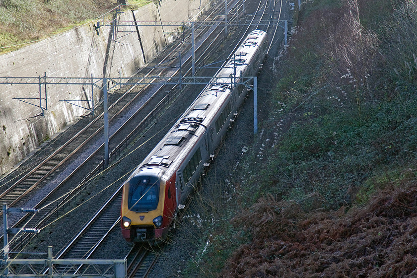 Class 221, VT 11.43 London Euston-Glasgow Central (Cancelled from Preston) (9S65), Roade cutting 
 A Virgin Voyager races through Roade cutting working the 11.43 Euston to Glasgow Central service. Unfortunately, the 9S65 service ran into some sort of trouble described on RTT as 'an unidentified problem' with the train cancelled from Preston. I hope that any revellers heading to Glasgow for New Year celebrations were able to make it by other means! 
 Keywords: Class 221 VT 11.43 London Euston-Glasgow Central Cancelled from Preston 9S65 Roade cutting Virgin Voayger