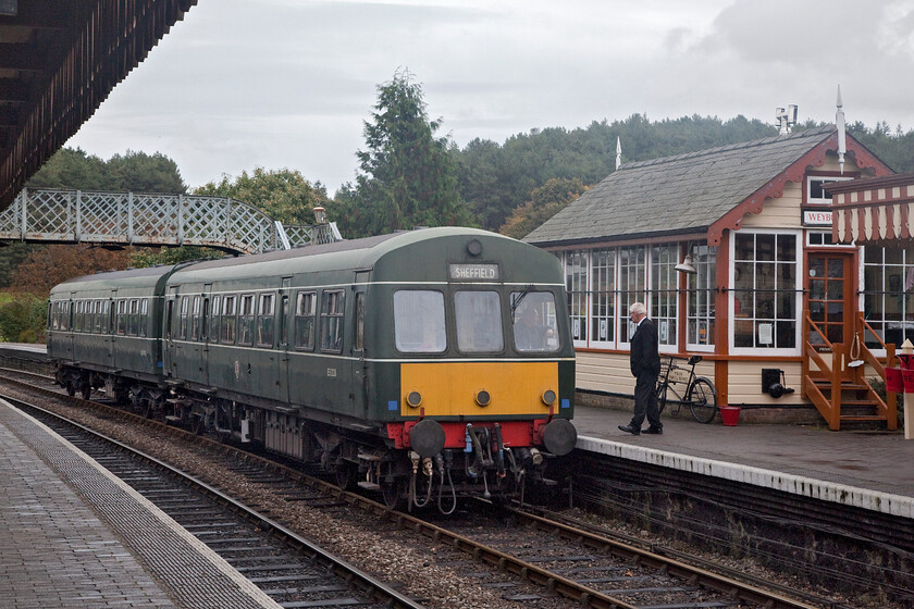 E56062 & E51228, 10.30 Sheringham-Holt Weybourne station 
 The signalman and the driver exchange a few words at Weybourne prior to the departure of the 10.30 Sheringham to Holt service on 17th October 2022. The train is operated using one of the Poppy Line's two resident Class 101 DMUs, in this case driving trailer E56062 is leading driving motor brake E51228. Built in 1958 the Class 101s were among the most successful of the many different designs of first-generation DMUs with these two ending their mainline operation with ScotRail in 2000. 
 Keywords: E56062 E51228 10.30 Sheringham-Holt Weybourne station Class 101 DMU