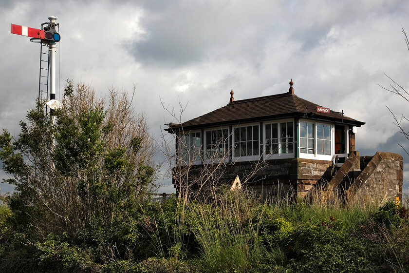 Arnside down starter & signal box (Furness, 1897) 
 The 1897 Furness signal box at Arnside is tricky to get a decent photograph of. This image is captured from Station Road standing on the retaining wall to gain a little extra height. I first photographed the box during my 1985 visit and took a very similar image then. When I have scanned and processed it, I will put a link here. 
 Keywords: Arnside down starter signal box Furness