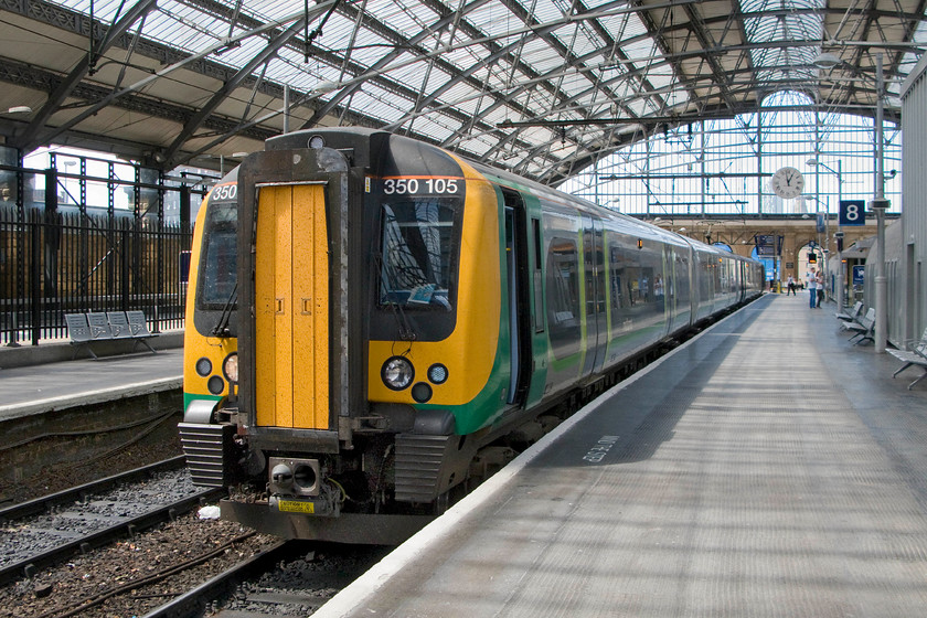 350105, LM 13.05 Liverpool Lime Street-Birmingham New Street (1L97), Liverpool Lime Street station 
 350105 stands inside Liverpool Lime Street's grand trainshed preparing to depart with the 13.05 to Birmingham New Street. At the moment platforms, eight and nine are open with access also afforded to Virgin's platform seven behind where I am standing. All the other platforms are gated and I have never had any success gaining access to take photographs unless having a valid ticket to travel. 
 Keywords: 350105 13.05 Liverpool Lime Street-Birmingham New Street 1L97 Liverpool Lime Street station London Mildand Desiro