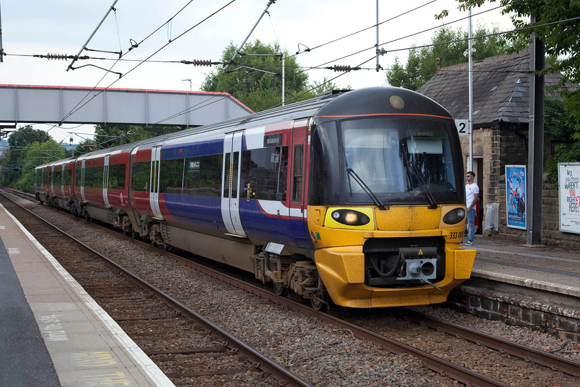 333008, NT 15.10 Ilkley-Leeds (2V41, 21L), Menston station 
 333008 arrives at Menston station working the 21 minute late 15.10 Ilkley to Leeds. Menston is a commuter town on the northern outskirts of both Leeds and Bradford. It is also the connecting station for passenger travelling by train to Leeds and Bradford Airport utilising a dedicated bus shuttle service from the large station carpark. 
 Keywords: 333008 2V41 Menston station