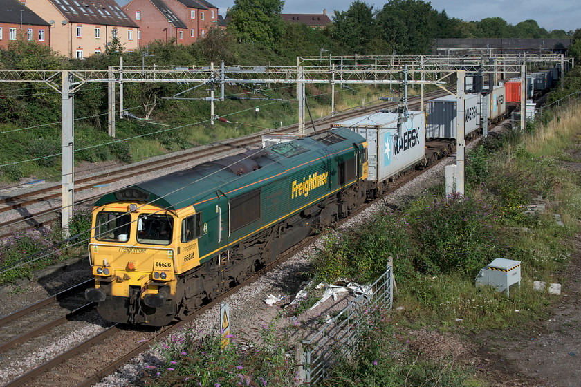 66526, 06.00 Crewe Basford Hall-Felixstowe North (4L41, 3E), site of Roade station 
 66526 'Driver Steve Dunn (George)' passes the site of Roade's former station leading the 4L41 06.00 Crewe Basford Hall to Felixstowe Freightliner service. This is one of my least photographed local freight flows that does not always run but is one that is usually diesel hauled. 
 Keywords: 66526 06.00 Crewe Basford Hall-Felixstowe North 4L41 site of Roade station Driver Steve Dunn (George) Freightliner