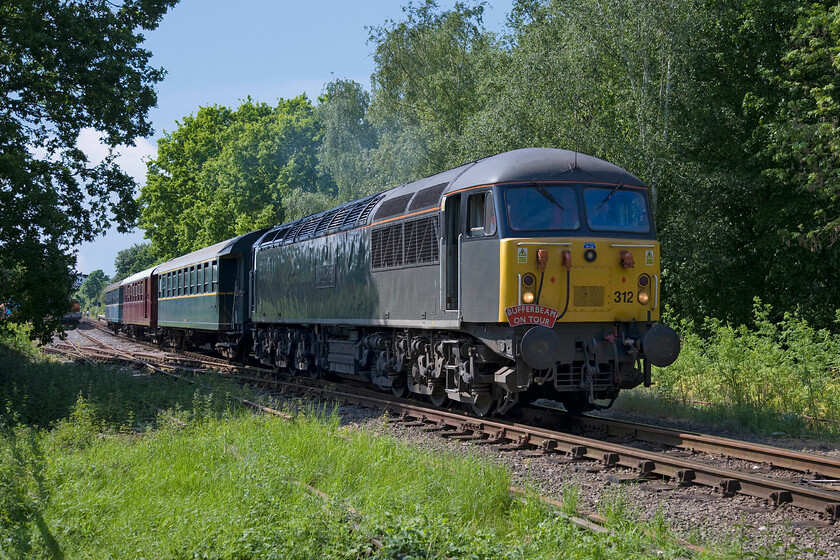 56312, 14.32 Yarwell Junction-Peterborough NV (1E52), Ferry Meadows TL153970 
 Devon and Cornwall Railway's 56312 'Jeremiah Dixon' hauls the 14.32 Yarwell Junction to Peterborough NV away from Ferry Meadows station. DCR is a subsidiary of British American Railway Services that itself is owned by Iowa Pacific Holdings. They have made some forays into the conveyance of freight and have attempted to operate passenger trains between Okehampton and Exeter St. David's from May 2010 but this never came to fruition. 
 Keywords: 56312 14.32 Yarwell Junction-Peterborough Nene Valley 1E52 Ferry Meadows TL153970 Jeremiah Dixon