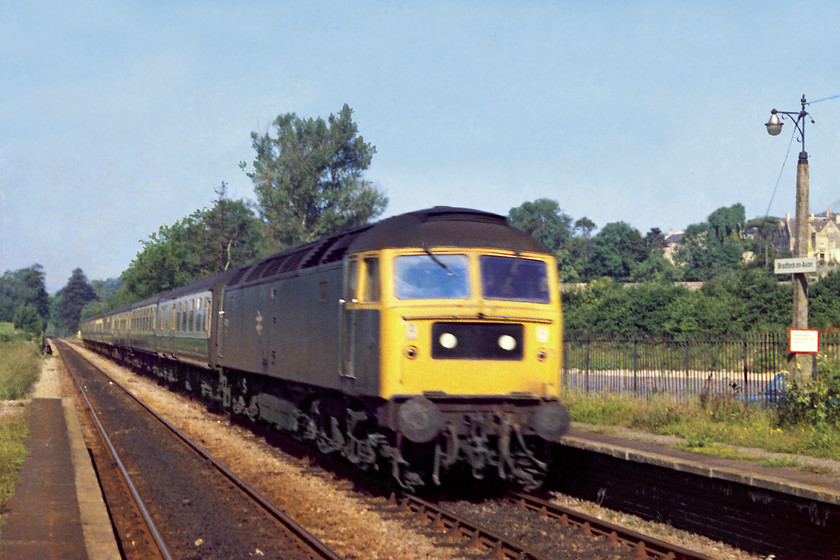 47239, unidentified Weymouth working, Bradford-on-Avon Station 
 Whilst waiting for our train to Bristol, my mates and I witnessed 47239 pass through Bradford-on-Avon at speed on what I can only assume to be a Weymouth relief train. Back in BR days, there was the flexibility to meet demand by laying on Summer Saturday relief trains on busy and popular routes. In today's highly structured railway, this simply would not happen...progress; I'm not so sure? Apologies for the motion blur in this image but the maximum 1/150sec. shutter speed was simply not fast enough to freeze this train! This locomotive is still with us in 2020 now operated by Rail Operations Group undertaking various stock moves around the country running as 47812, see... https://www.ontheupfast.com/p/21936chg/29418723204/x2-47812-05-41-chaddesden-sidings 
 Keywords: 47239 Weymouth Bradford-on-Avon station 47812 ROG Rail Operations Group