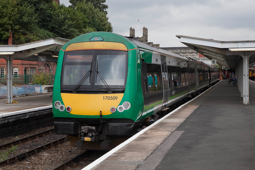 170509 & 170501, LM 12.47 Shrewsbury-Birmingham New Street (1G33), Shrewsbury station 
 Just catching a little bit of sunshine as it breaks through a chink in the cloud, 170509 and 170501 rest between duties at Shrewsbury before working the return 1G33 12.47 to Birmingham New Street. 
 Keywords: 170509 170501 12.47 Shrewsbury-Birmingham New Street 1G33 Shrewsbury station