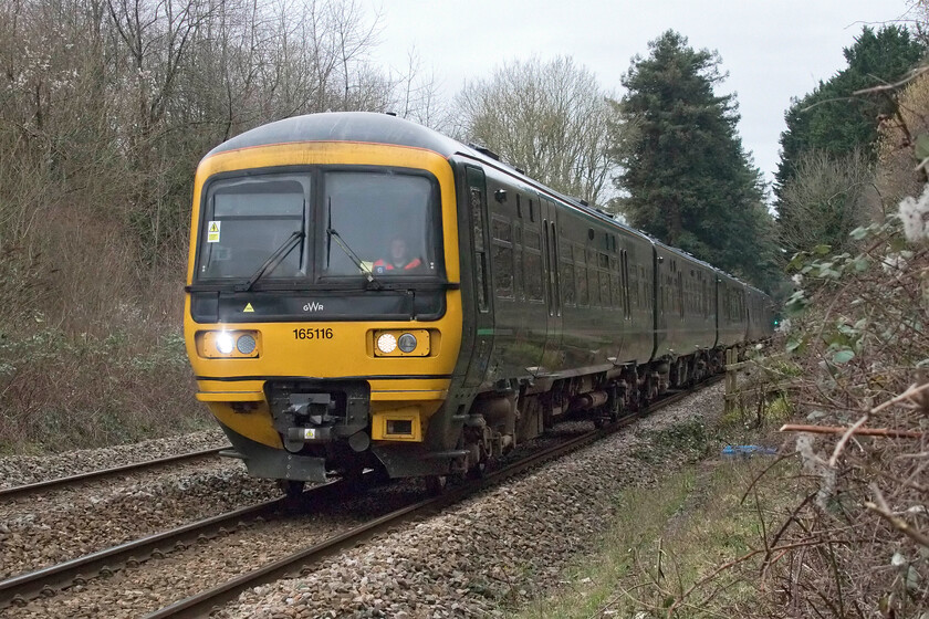 165116, GW 09.28 Cardiff Central-Portsmouth Harbour (1F11, 8L), Bradford-on-Avon no. 1 crossing ST822605 
 A nailbiting and stressful time for a railway photographer is when standing on the wrong side of the line and a normal train is due in the other direction thus with the possibility of it blocking out the intended subject known in the circles as being bowled! With the steam charter approaching fast from behind me 165116 approached Bradford-on-Avon at a tantalisingly slow pace working the 09.28 Cardiff to Portsmouth Harbour GWR service. 
 Keywords: 165116 09.28 Cardiff Central-Portsmouth Harbour 1F11 Bradford-on-Avon no. 1 crossing ST822605 GWR Great Western Railway Turbo