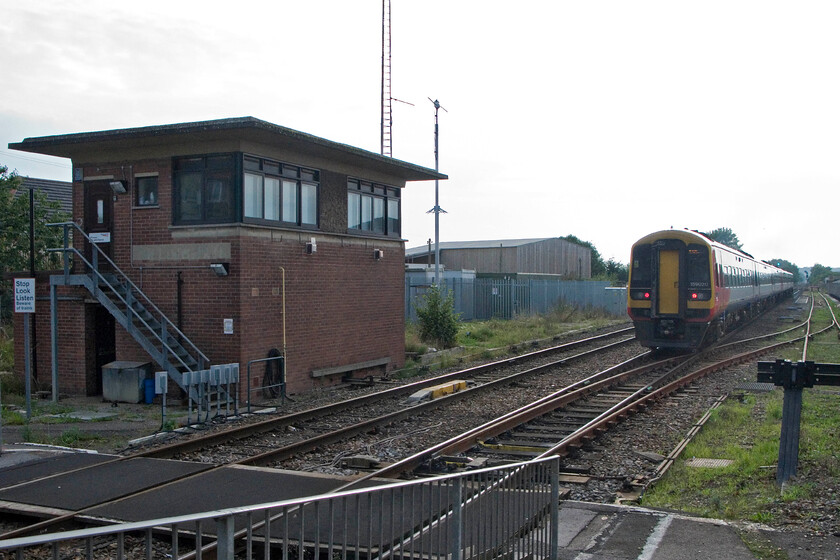 159020 & 159019, SW 14.20 London Waterloo-Exeter St. David's (1L41), Gillingham station 
 Having alighted from the 14.20 Waterloo to Exeter St. David's service at Gillingham (Dorset) I turned my camera into the afternoon light to picture its departure having just passed the 1957 built British Railways signal box. My wife, son and I had travelled aboard 159020 and 159019 from Salisbury. 
 Keywords: 159020 159019 SWT 14.20 London Waterloo-Exeter St. David's 1L41 Gillingham station