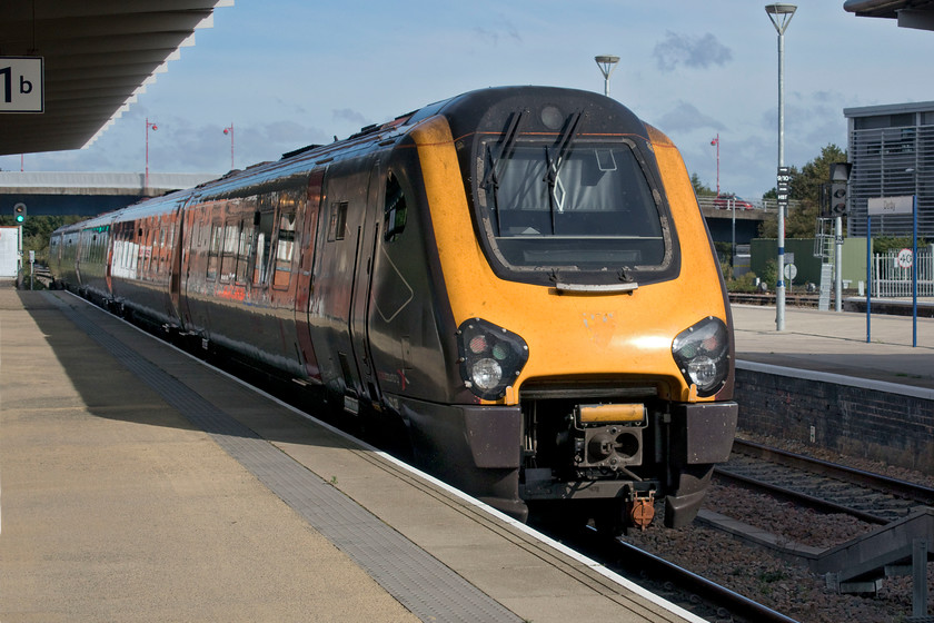 221138, XC 06.27 Plymouth-Edinburgh Waverley (1S39, RT), Derby station 
 A photograph for the records of 221138 leaving Derby station with the 06.27 Plymouth to Edinburgh as Andy and I had just travelled on it from Birmingham New Street. Seating on the train was very restricted with no reservations despite our advanced ticket indicating that we had them. Passengers could only sit at window seats one to a pair. As soon as we left New Street a team of fully COVID proofed cleaners disinfected all the empty seats, tables and other fittings. The train manager did undertake a ticket check but did not like it that we had paper tickets meaning that he had to handle them. So, I was asked to place them out on the adjacent drop-down table and he marked them with a blue marker pen. 
 Keywords: 221138 06.27 Plymouth-Edinburgh Waverley 1S39 CrossCountry Trains Derby station Voyager