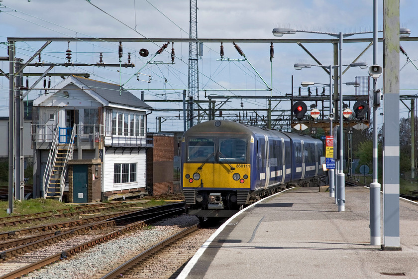 360111, 11.05 Clacton-on-Sea-London Liverpool Street (1N35), Clacton-on-Sea station 
 Greater Anglia Desiro 360111 leaves Clacton-on-Sea station working the 11.05 service to Liverpool Street, a journey of some sixty-nine miles. In this scene, the Great Eastern 1891 signal box stands to the left that controls the plethora of ancient 'searchlight' colour signals dating from when the line was electrified. 
 Keywords: 360111 11.05 Clacton-on-Sea-London Liverpool Street 1N35 Clacton-on-Sea station Desiro