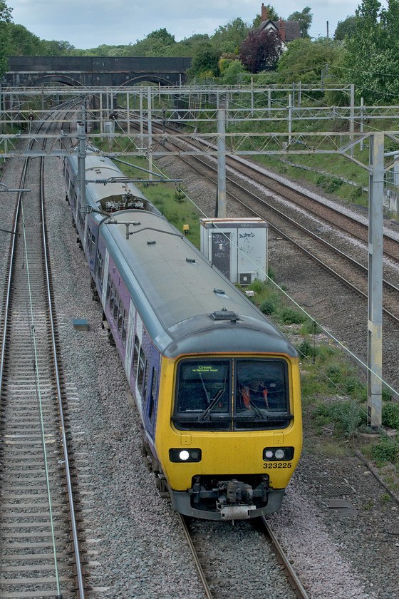 323225, 14.47 Allerton Depot-Wolverton Centre Sidings (5Q36, 137E), site of Roade station 
 I had been monitoring the progress of this unit since it left Allerton depot on Merseyside over an hour early. It had progressively been gaining time and by the time it was approaching its journey's end on the up fast line at Roade it was considerably over two hours early! 313225 was heading to the works for a 'light' overhaul replacing 323233 that had left earlier in the morning. See...... https://www.ontheupfast.com/p/21936chg/29043767004/x323233-09-48-wolverton-centre-sidings. Notice, that according to its destination screen, its last journey (apart from running empty to Allerton depot) was a Manchester Piccadilly to Crewe via Manchester Airport service. 
 Keywords: 323225 14.47 Allerton-Wolverton centre sidings 5Q36 site of Roade station Northern