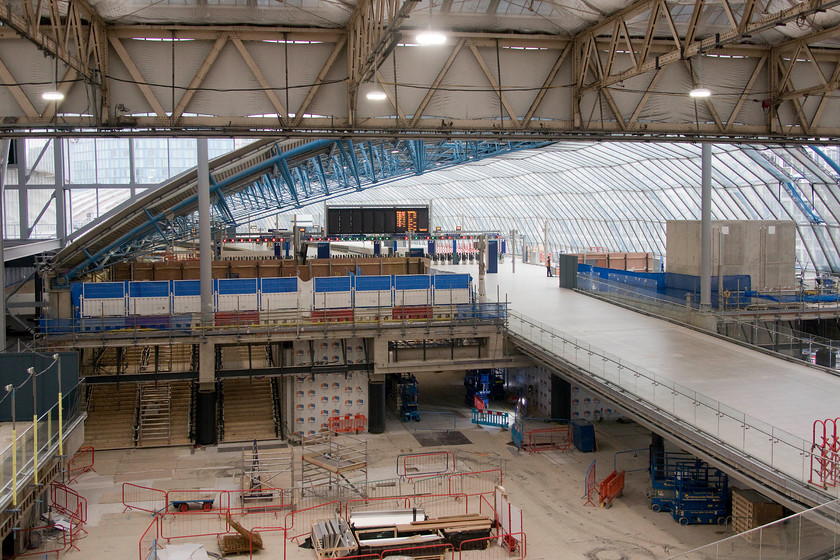 Former Eurostar platforms under development, London Waterloo station 
 I took a very similar picture last year and I have to say that the amount that has been achieved in exactly a year is not exactly a lot! A look at.... https://www.ontheupfast.com/v/photos/21936chg/25090990804/former-eurostar-platforms-under reveals that the ramp is complete and I read in the railway press that it has actually been used. However, once again, I am disturbed by the disappointing progress that Network Rail make on grand projects like this despite all their protestation when trying to justify shutting huge parts of the network over busy periods like Christmas and New Year! 
 Keywords: Former Eurostar platforms London Waterloo station