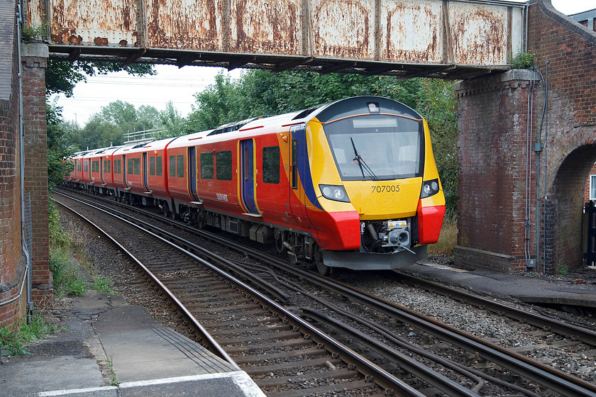 707005, 13.04 Clapham Yard-Bournmouth EMD ECS (5Q80), Totton station 
 Brand new and out of the box, 707005 operates a test train through Totton station as the 13.94 Clapham to Bournmouth EMD (5Q80). They are due to enter service any day soon during July or August 2017. The crazy thing about these smart looking units is that they are actually surplus to requirement before their introduction! With the introduction of the class 701 Aventras in 2019 lower running costs will meant that these 707s will be looking for new work! This just goes to prove that we need to have a far more joined up and centralised approach to procurement so that it works efficiently for the passengers and the tax payers. 
 Keywords: 707005 13.04 Clapham Yard-Bournmouth EMD ECS 5Q80 Totton station