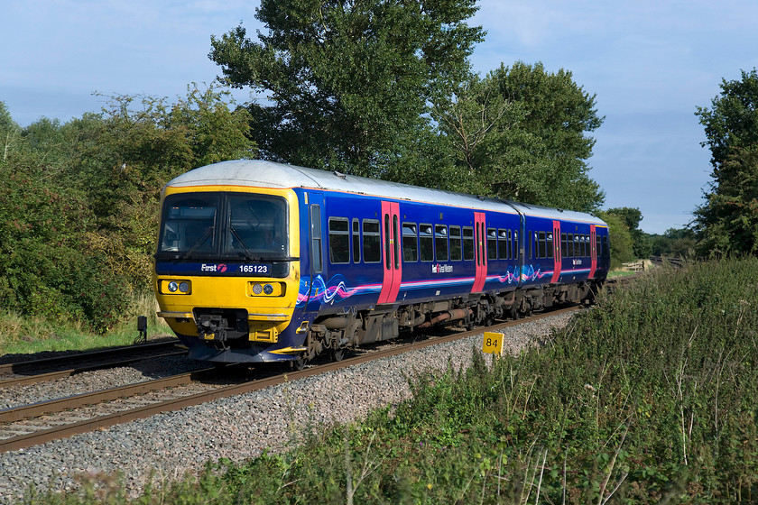 165123, GW 09.02 Banbury-Oxford (2L39), King`s Sutton SP486377 
 165123 hurries south at King's Sutton with the 09.02 Banbury to Oxford. This shuttle service is a little of a First Great Western outpost but as such it the only operator to serve Heyford and Tackely stations. 
 Keywords: 165123 09.02 Banbury-Oxford 2L39 KIng`s Sutton SP486377 First Great Western