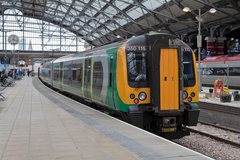 350115, LN 12.34 Liverpool Liverpool Lime Street-Birmingham New Street (1L77, RT), Liverpool Lime Street station 
 Lime Street's clock reads 12.16 so 350115 has 17 minutes before departure with the 12.34 to Birmingham New Street, My family and I took this train all the way to Birmingham as the first part of our journey home. 
 Keywords: 350115 1L77 Liverpool Lime Street station