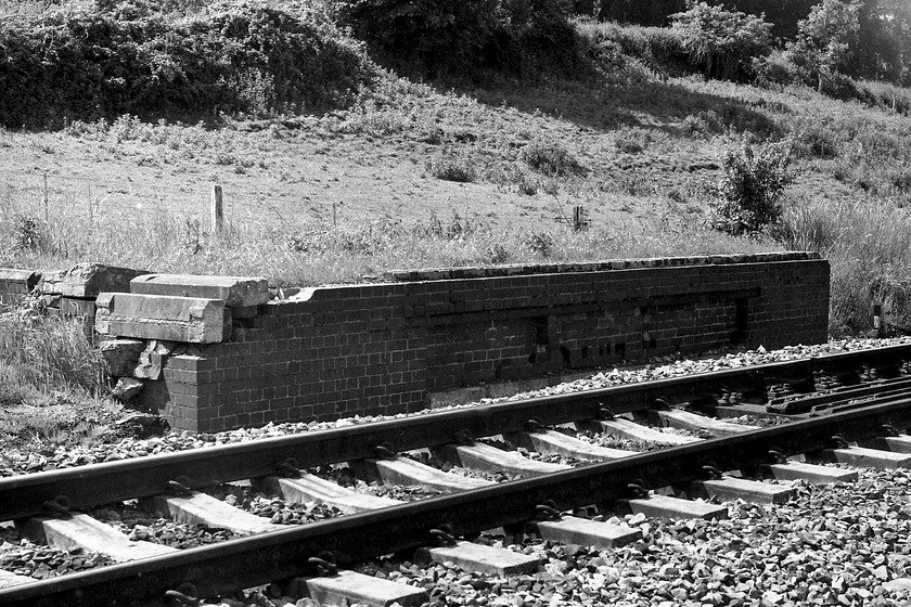 Base of former Bathampton West signal box 
 The brick base of the former Bathampton West signal box. The box closed on 21.09.56 along with the East signal box to be replaced by a single box on the end of the up platform at the station. This is a relatively remote spot despite being close to the city of Bath, behind the greenery at the top of the photograph is the Kennet and Avon Canal. 
 Keywords: Bathampton West signal box