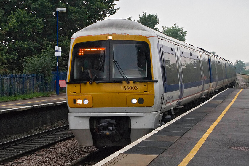 168003, CH 09.48 Stratford-on-Avon-London Marylebone, King's Sutton station 
 168003 arrives at King's Sutton station working the 09.48 Stratford-on-Avon to Marylebone Chiltern service. We travelled on this train to the capital enjoying an alternative route to our more usual one using the WCML which was closed for Bank Holiday engineering works. 
 Keywords: 168003 09.48 Stratford-on-Avon-London Marylebone King's Sutton station Chiltern Turbo