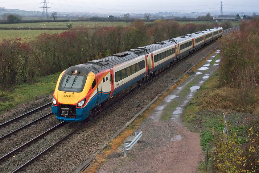 222001, EM 07.31 Sheffield-London St. Pancras (1C20, 1L), Braybrooke SP769849 
 The 07.31 Sheffield to St Pancras service passes Braybrooke just south of Market Harborough worked by 222001 that still wears its East Midlands Trains livery. With these units being off-lease and looking for new work by this time next year it is unlikely that many more Meridians will be repainted into the EMR purple paint scheme but who knows? 
 Keywords: 222001 07.31 Sheffield-London St. Pancras 1C20 Braybrooke SP769849 East Midlands Railway EMR Meridian