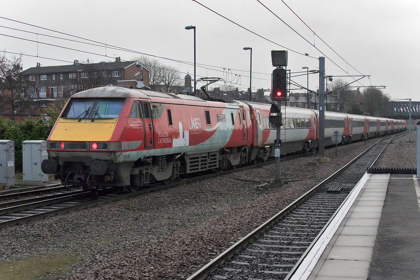 91114, GR 14.30 Edinburgh-London King`s Cross (1E19, 3L), York station 
 91114 'Durham Cathedral' powers the rear of the 14.30 Edinburgh to London King's Cross. The train is seen leaving York station and was one of very few that were running close to their scheduled time. Incredible delays were caused by a fatality on the line at Chester-Le-Street. 
 Keywords: 91114 14.30 Edinburgh-London King`s Cross 1E19 York station