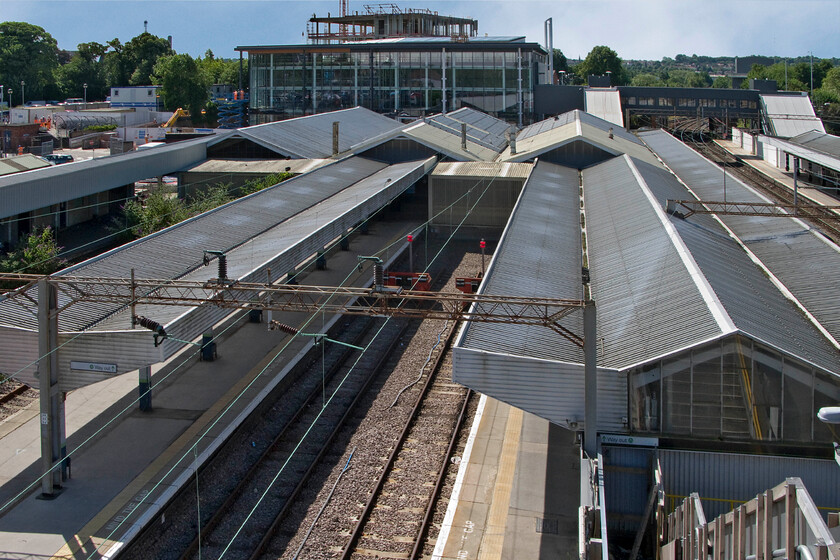 Platforms 1,2 & 3, Northampton station (from temporary footbridge) 
 A view from the temporary footbridge installed at Northampton station reveals an interesting view of the two north-facing bay platforms numbered one, two and three. The former platform four has had its track removed with platform three not electrified at present. When the temporary footbridge is removed this unique view will no longer be available. 
 Keywords: Platforms 1,2 & 3 Northampton station