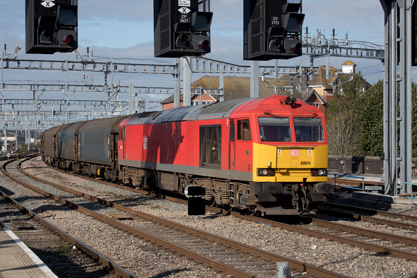 60011, 09.22 Margam-Llanwern Exchange Sidings (6H25), Cardiff Central station 
 60011 passes through Cardiff's up centre road with the 09.22 Margam to Llanwern steel train. This 6H25 working only travels a modest forty-four miles but carries a lot of very heavy steel that would otherwise be on a fleet of HGVs choking up the M4. The last time that I saw 60011 was in a very different location on the other side of the country and in very different weather but it was, again, hauling a very heavy train, exactly what these powerful locomotives were designed for, see..... https://www.ontheupfast.com/v/photos/21936chg/27343878004/x60011-11-38-redcar-b-s-c-scunthorpe 
 Keywords: 60011 09.22 Margam-Llanwern Exchange Sidings 6H25 Cardiff Central station