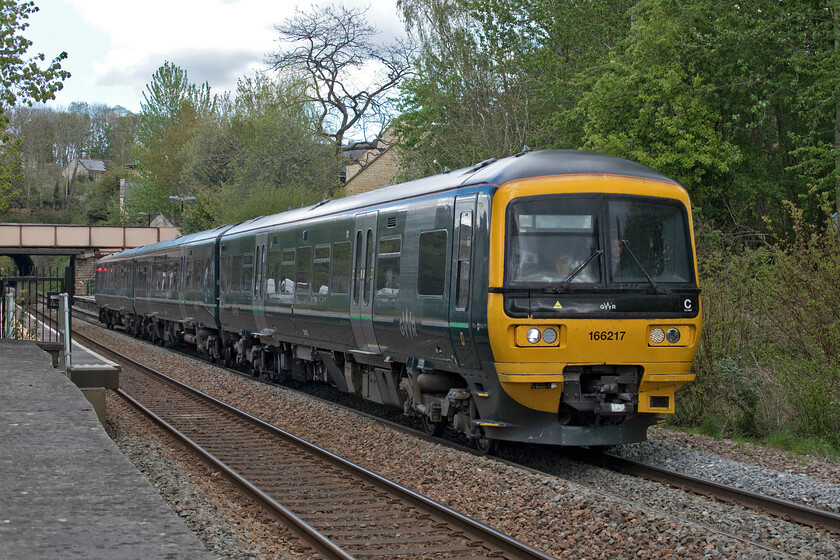 166217, GW 13.11 Weymouth-Gloucester (2V68, RT), Bradford-on-Avon station 
 166217 leaves Bradford-on-Avon station working the 13.11 Weymouth to Gloucester GWR service. The photograph is taken from the station car park that occupies the site of the former goods yard. 
 Keywords: 166217 13.11 Weymouth-Gloucester 2V68 Bradford-on-Avon station Great Western Railway