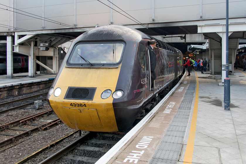 43384, XC 06.11 Leeds-Plymouth (1V34, 23L), Birmingham New Street station 
 The driver of 43384 looks eagerly back along his train as it waits at Birmingham New Street. He will be keen to get the 1V34 06.11 Leeds to Plymouth underway as soon as possible as it was already some fifteen minutes late. Unfortunately, things did not go to plan as the train arrived into Plymouth twenty-three minutes down. However, as a passenger, I would probably have forgiven this lateness as I was on an HST rather than a dreadful Voyager! 
 Keywords: 43384 06.11 Leeds-Plymouth 1V34 Birmingham New Street station