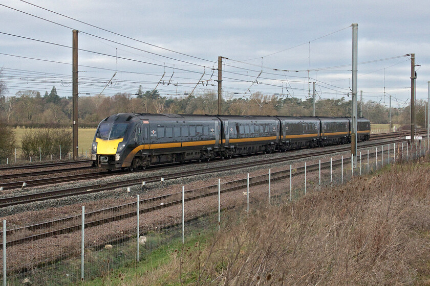 180114, GC 06.44 Sunderland-London King's Cross (1A60, 8L), Tallington Dowmac 
 180114 'Kirkgate Calling' passes Tallington's Dowmac concrete plant working the 06.44 Sunderland to King's Cross Grand Central service. The name was appointed to the unit during the summer of 2018 to celebrate the rejuvenation of Wakefield Kirkgate station following major improvements made to the local station that features on Grand central's named West Riding route. 
 Keywords: 180114 06.44 Sunderland-London King's Cross 1A60 Tallington Dowmac Grand Central Kirkgate Calling