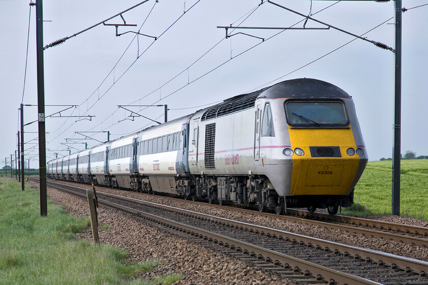 43308, GR 14.00 Edinburgh Waverley-London King's Cross (1A18), Frinkley Lane crossing SK906436 
 What a difference an hour or so makes! With the sun now out the illumination of the HST lead by power car 43308 is so much better than https://www.ontheupfast.com/p/21936chg/30012183805/x43272-13-00-edinburgh-waverley-london The East Coast HST is working the 1A18 14.00 Edinburgh to Kin's Cross train. 43308 has always been an East Coast Mainline power car being part of set 254027 as 43108. 
 Keywords: 43308 14.00 Edinburgh Waverley-London King's Cross 1A18 Frinkley Lane crossing SK906436 East Coast HST