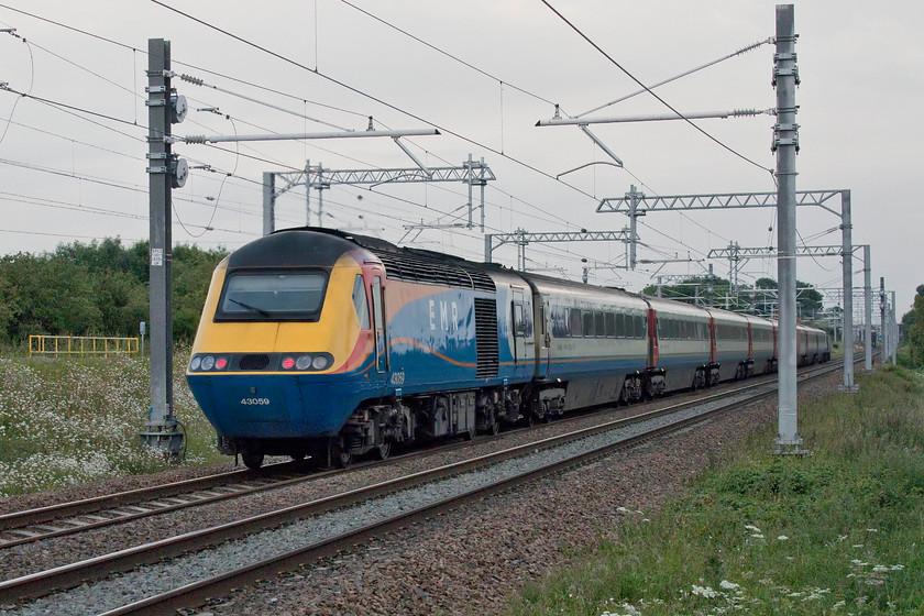 43059, 18.45 Nottingham-London St. Pancras (1B74, 1E), Irchester SP927667 
 The light has really begun to deteriorate now but an HST is an HST! The 18.45 Nottingham to St. Pancras heads south past a very dull Irchester with 43059 providing the power at the rear of the train. Unfortunately, I did not manage to get the number of the EMR power car at the front. 
 Keywords: 43059 18.45 Nottingham-London St. Pancras 1B74 Irchester SP927667 EMR East Midlands Railway