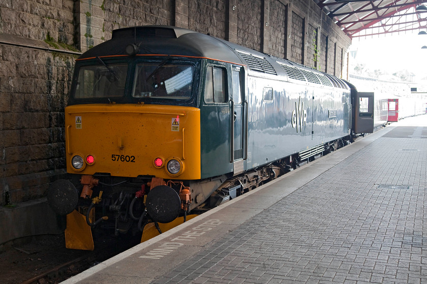 57602, 08.22 Penzance-Penzance MPD ECS (5C99), Penzance station 
 Having arrived at Penzance, the Night Riviera Sleeper has been emptied of its passengers and is now waiting to be towed the short distance to Penzance MPD at Long Rock to be cleaned and serviced before working back to London the coming night. 57602 'Restormel Castle' did a good job the previous night working down from Paddington arriving two minutes early into a gloriously sunny Penzance! 
 Keywords: 57602 08.22 Penzance-Penzance MPD ECS 5C99 Penzance station