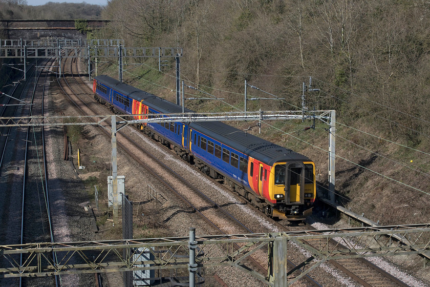 156410 & 156415, 11.00 Etches Park-Wolverton Centre sidings (5Z56, 8E), Roade A508 bridge 
 Wolverton Works has a proud history of railway engineering dating back to 1836. In recent years it has stared closure in the face a number of times and has gone through a number of owners. In November 2018 Gemini Rail took over the works and there has been a noticeable increase in traffic in and out undergoing maintenance and modification. I am not sure why EMR are sending their Super Sprinters 156410 and 156415 to Wolverton but they certainly provide a little variety passing Roade on the WCML as the 5Z56 11.00 Etches Park to Wolverton Centre sidings. 
 Keywords: 156410 156415 11.00 Etches Park-Wolverton Centre sidings 5Z56, 8E Roade A508 bridge Sprinter East Midkands Railway EMR Gemini Rail