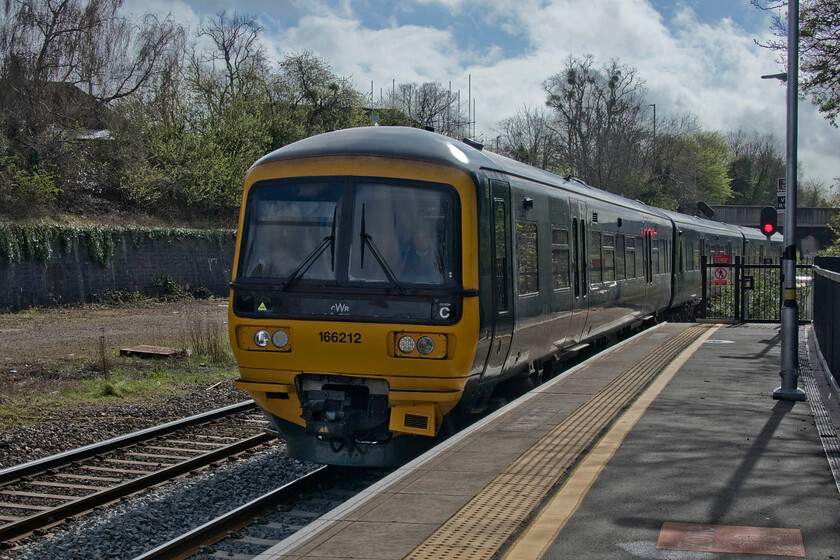 166212, GW 13.40 Westbury-Great Malvern (2E65, RT), Cheltenham station 
 With a little tweaking in Photoshop, this image taken, rather irritatingly, into the afternoon sunshine presents reasonably well. 166212 arrives at Cheltenham Spa station working the 2E65 14.40 Westbury to Great Malvern service. 
 Keywords: 166212 13.40 Westbury-Great Malvern 2E65 Cheltenham station GWR Great Western Railway