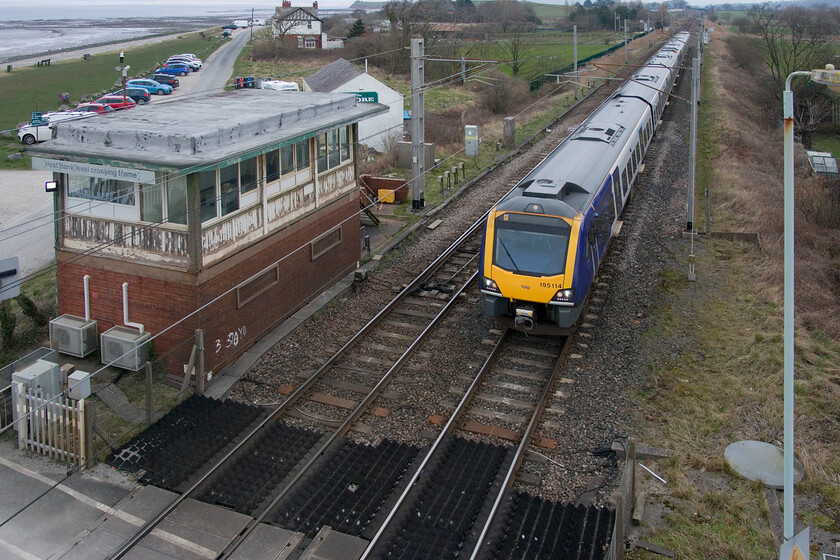 195114 & 195129, NT 13.07 Windermere-Manchester Airport (1Y81, 6L), Hest Bank 
 A pair of Northern's Civity DMUs head south past Hest Bank working the 13.07 Windermere to Manchester Airport service. This photograph is taken from the very tall footbridge that crosses the line that required the lens to be at its smallest focal length which I do not use that often due to various distortion issues. The image needed some considerable work in Photoshop to get the vertical and horizontal distortions straightened out, a situation compounded by the fact that I was pointing the camera downward towards the line and the subject! 
 Keywords: 195114 195129 13.07 Windermere-Manchester Airport 1Y81 Hest Bank Civity Northern Trains