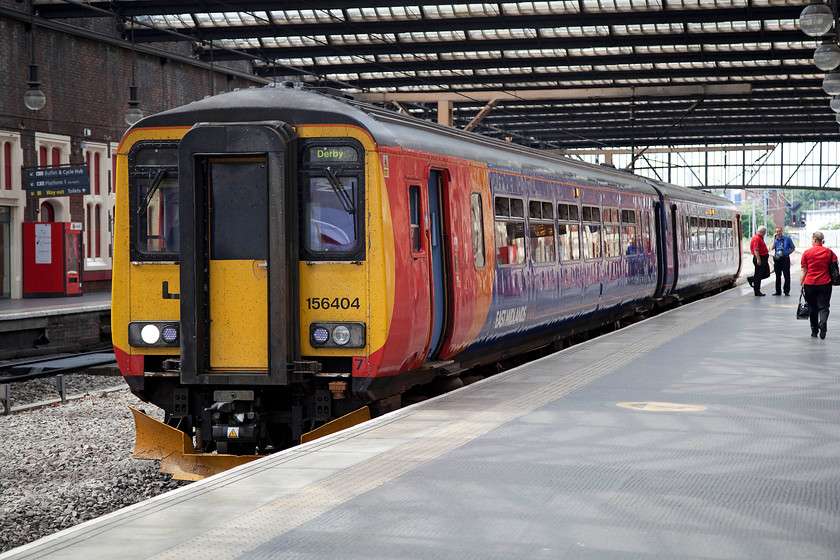 156404, EM 15.07 Crewe-Derby, Stoke-on-Trent station 
 Having arrived at a quiet Stoke-on-Trent station I alighted from this train, the 15.07 Crewe to Derby 1K18. I had travelled from Crewe with my trusty Brompton bike on 156404. 
 Keywords: 156404 15.07 Crewe-Derby Stoke-on-Trent station