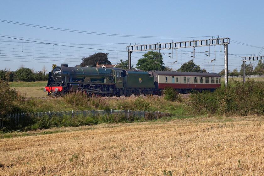 46100, 07.57 Crewe HS-Southall Loco Services Ltd (5Z45, 8E), between Roade & Ashton 
 I was hoping that this location at this time in the morning would have produced a slightly better photograph of 46100 'Royal Scot' but the sun had just gone round too far so as to not illuminate the side of the locomotive necessitating some Photoshop work to bring some detail back to the deep shadows. The former LMS Stanier was working the 07.57 Crewe HS to Southall positioning complete with a support coach in order to work the following day's 'Severn Valley Enterprise' charter from Paddington to Kidderminster. 
 Keywords: 46100 07.57 Crewe HS-Southall Loco Services Ltd 5Z45 between Roade & Ashton Royal Scot