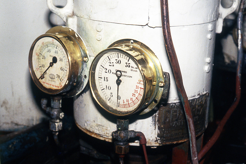 MV Farringford, brass pressure gauges 
 A pair of small vacuum gauges adjacent to the English Electric engines on MV Farringfrod. It looks as though they are attached to a pressurised tank of some kind. A little bit of Braso has been employed on the cowling of the gauges indicating a bit of care and love by the various crew members for the old ship! 
 Keywords: MV Farringford brass pressure gauges